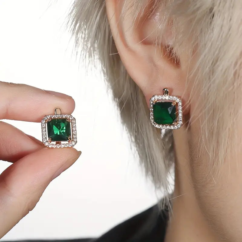 Orecchini in oro con smeraldo e zircon