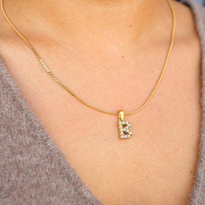 PEARL LETTER PENDANT.